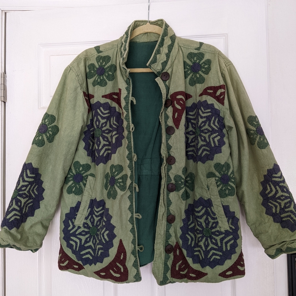 Green stitched design jacket